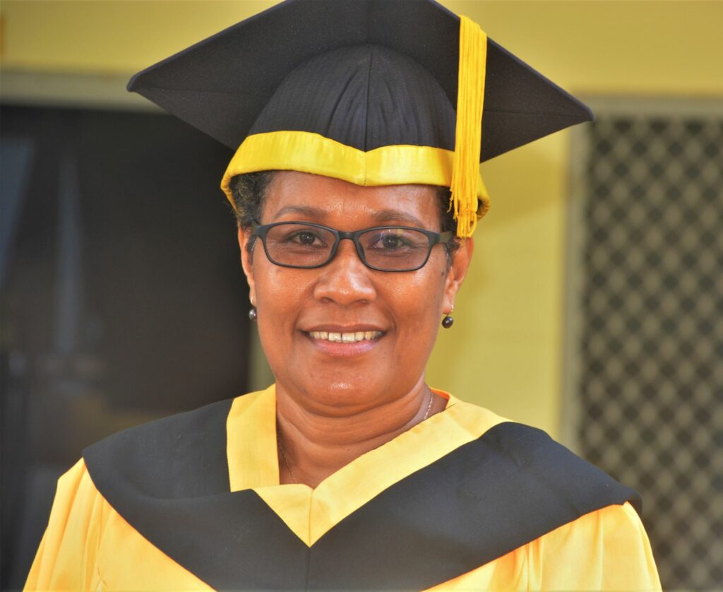 Mrs. Jacqueline Gabi, a mother of six children, was sponsored by the Bank of Papua New Guinea (BPNG) after working with BPNG for 22 years and successfully completed her studies at IBS University. She is the Recipient of the Excellence Award in the School of Business and Management at the IBS University. Mrs. Gabi expressed her greatest challenge was that being a mum of six, playing motherly role while studying wasn't easy. She is from Marshall Lagoon in Abau, Central Province of Papua New Guinea.