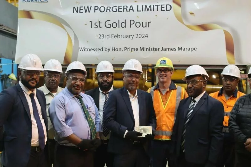 Image of a historic event unfolded in Papua New Guinea at Porgera Mine as Prime Minister James Marape poured the first gold, marking a monumental milestone in Papua New Guinea's mining history. The occasion, witnessed by dignitaries and community members alike, signifies a new era of prosperity and opportunity for the nation.