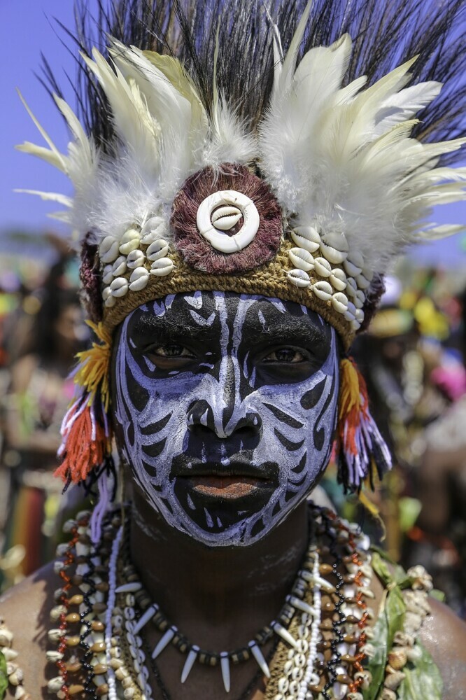 Image showing a young papua new guinea man dress in tradition chieftain head dress.