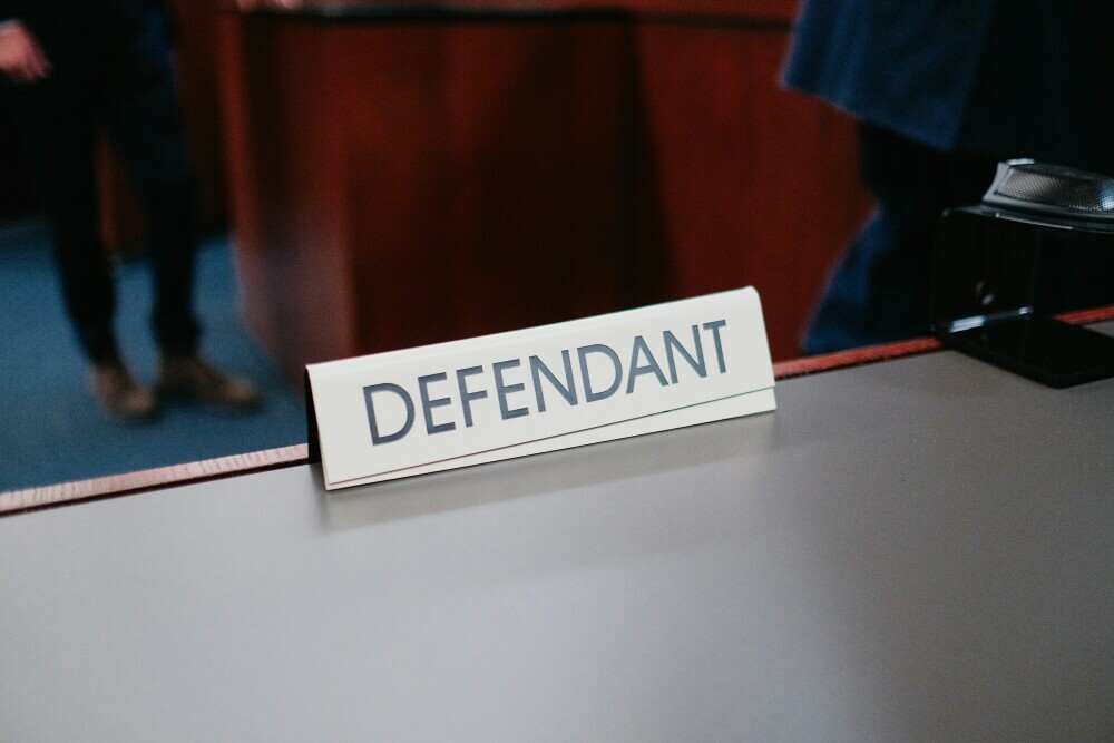 image showing defendant name tag in the courtroom.