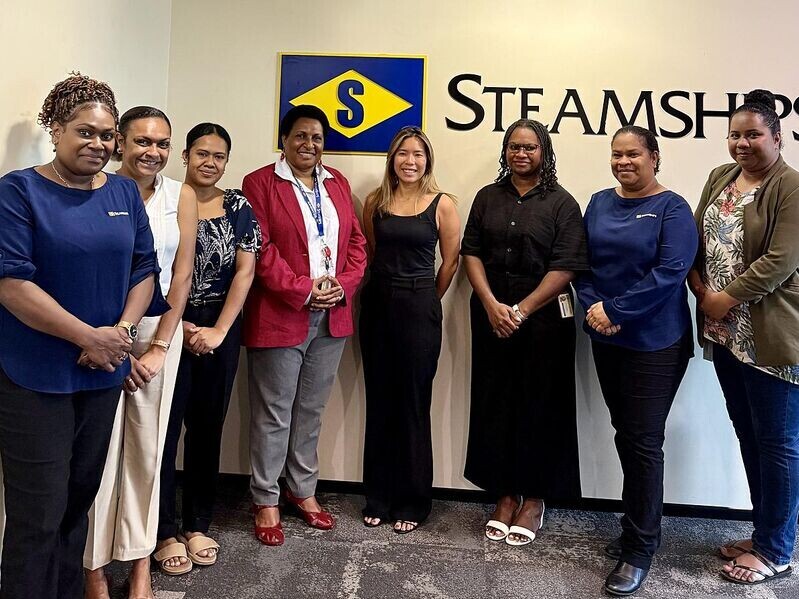 Ruth Kissam standing with women college from the steamships company